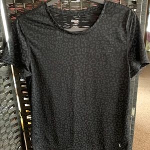 Get active with black floral Danskin now top.